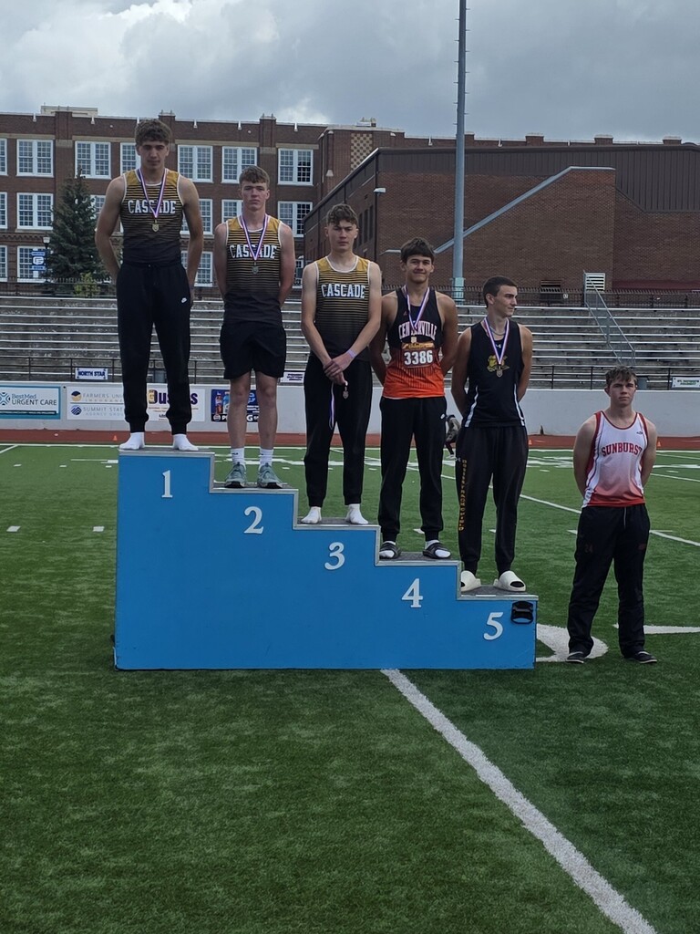 6 track athletes on a podium
