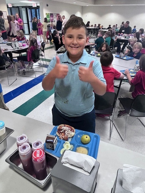 Yosef gives the lunch two thumbs up!