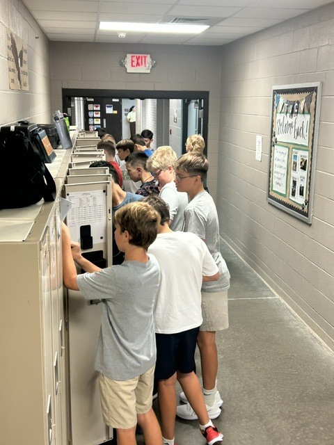 Middle School Boys at their Lockers