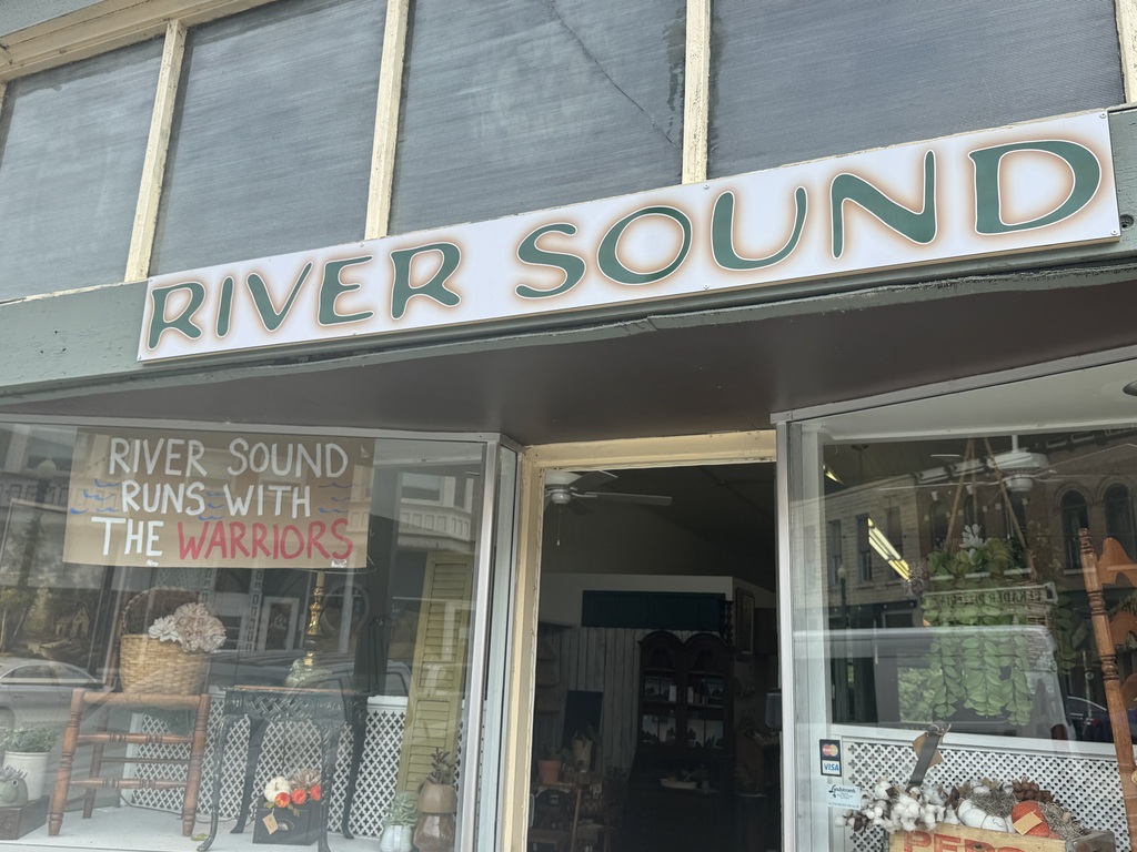 Storefront with Warrior sign in window