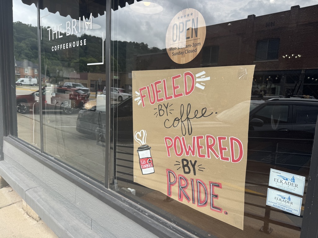 Storefront with Warrior sign in window