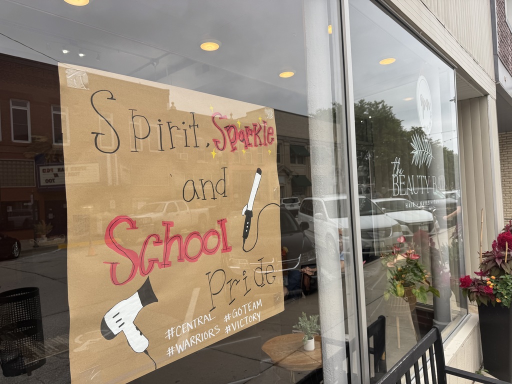 Storefront with Warrior sign in window