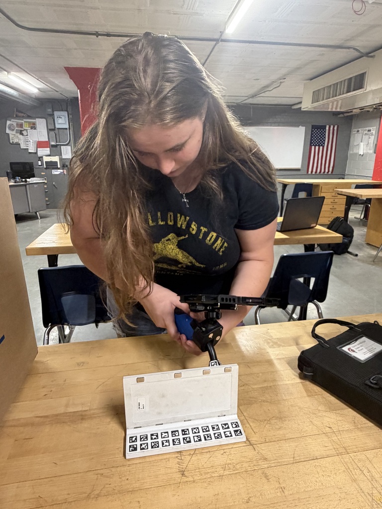 Student using welding simulator