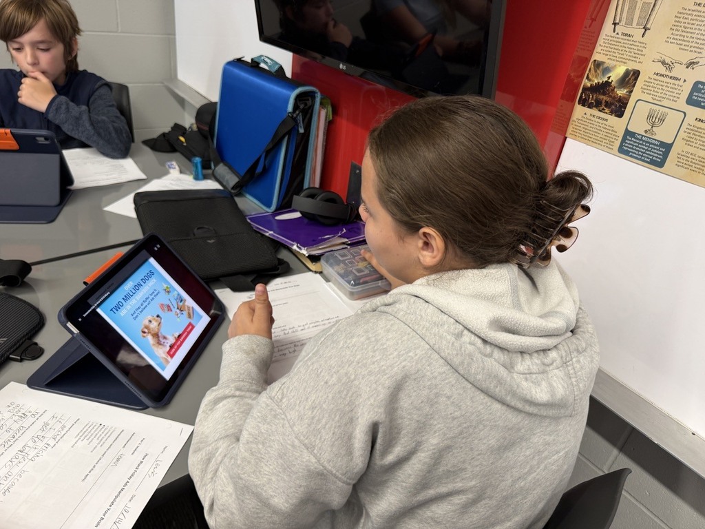 Students working with AI