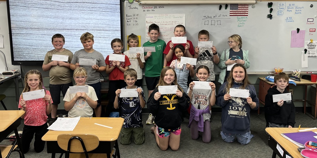 Third graders with their pen pal letters