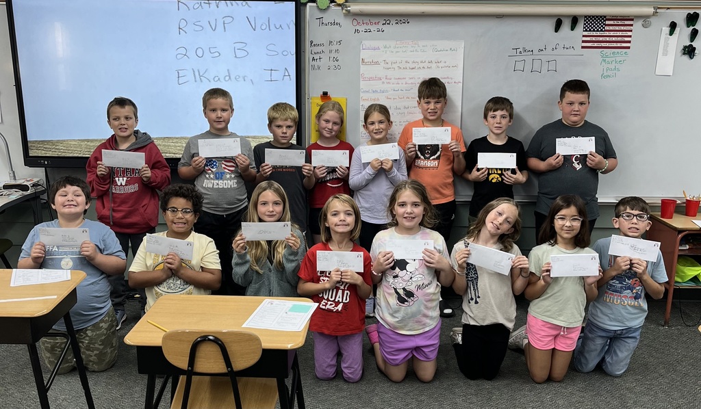 Third graders with their pen pal letters