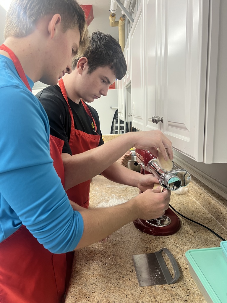 Students making homemade pasta