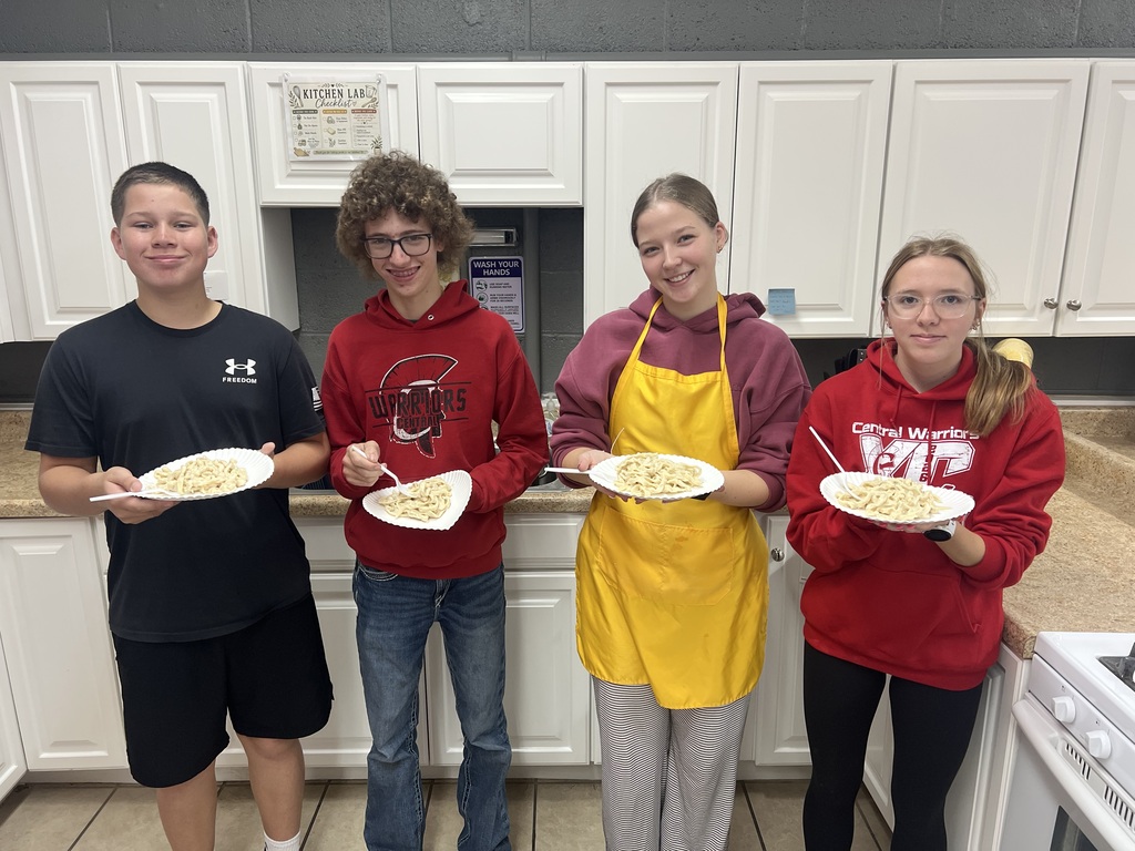 Students eating their homemade pasta