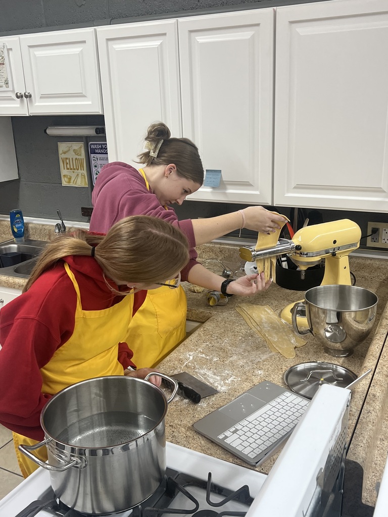 Students making homemade pasta