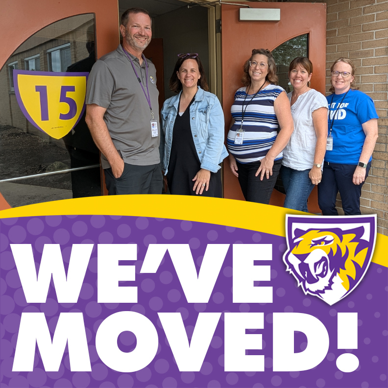 Administration Center staff in front of their new location at Door 15