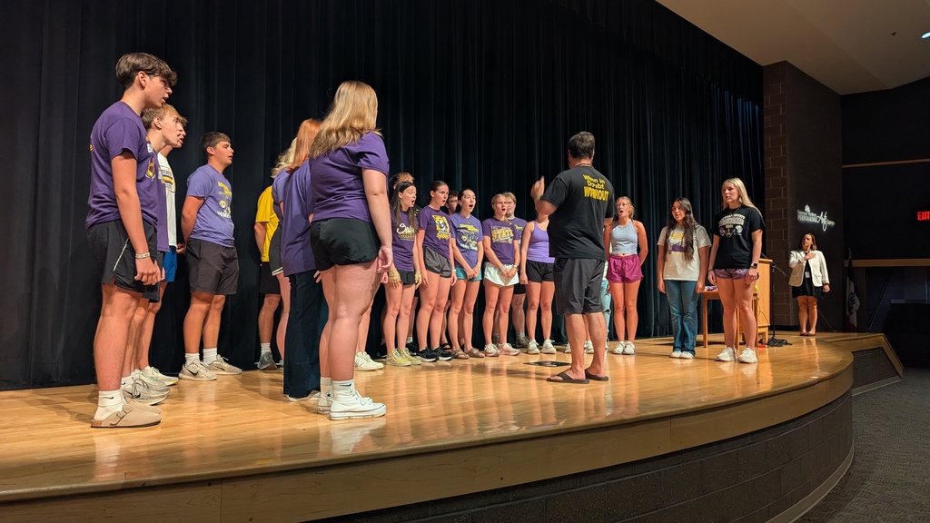 CDHS choir members perform the National Anthemm
