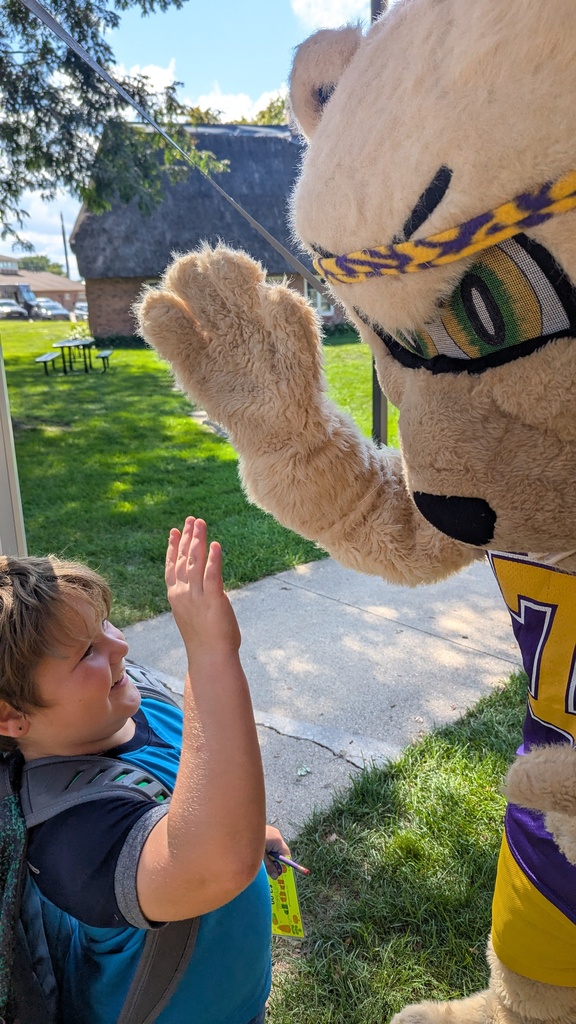 Slash hanging with out with Sabers at the DeWitt Farmers Market