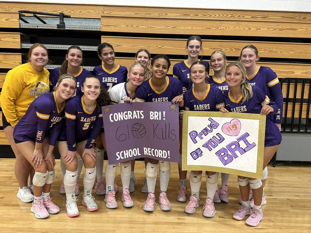 Bri Clark breaking school record for volleyball kills. Pictured with teammates