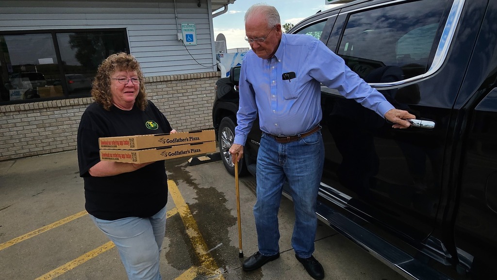 Roger Hill delivering pizza from DTM