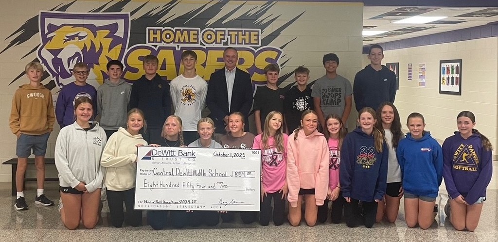 CDMS Honor Roll students accepting donation from DeWitt Bank & Trust Co. 