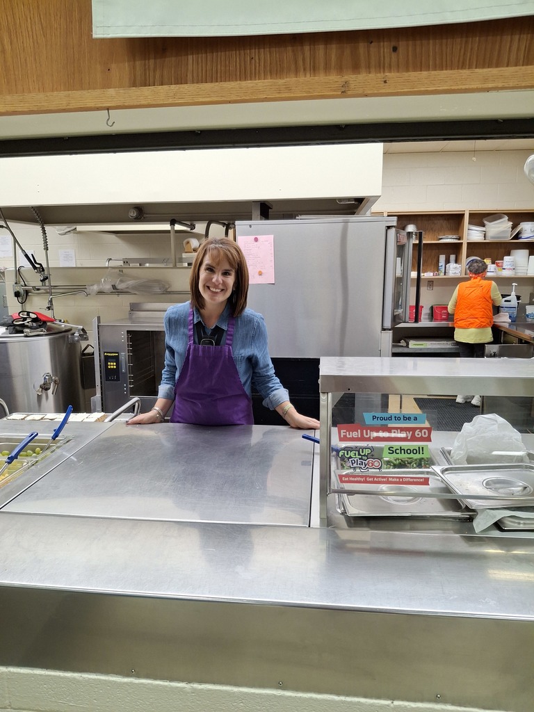 Mrs. Nelson serving lunch at Ekstrand