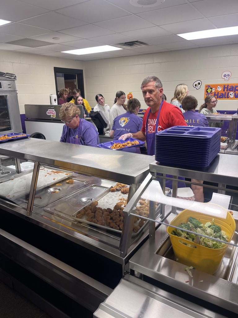 School Board Member Jed Ganzer serving lunch at the high school