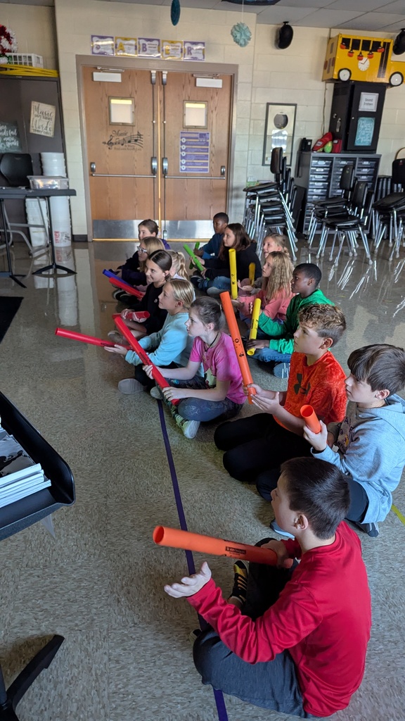 Students in Peer Stem class using Boomwhackers to learn about rhythm and how to read music