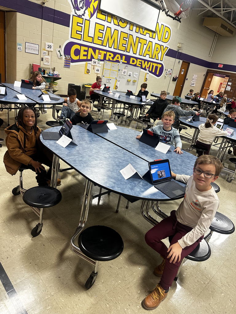 Third graders sharing their Animal Classification Research Projects  with first graders