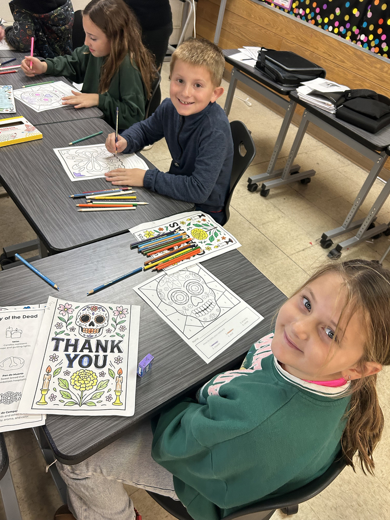 Third graders learning about Dia de los Muertos
