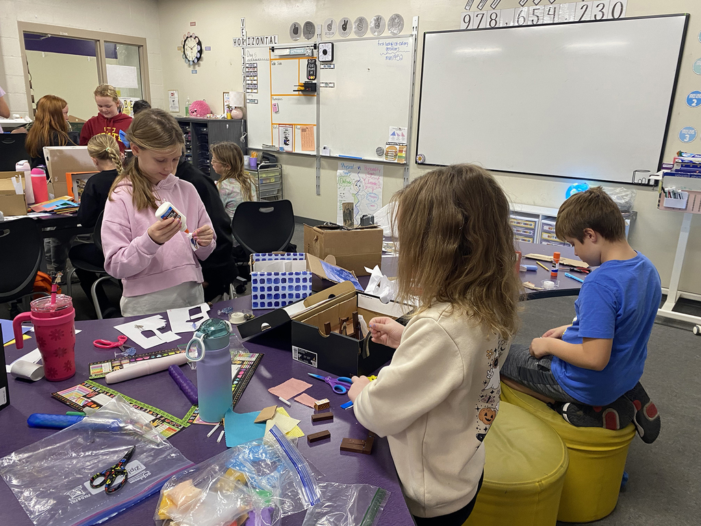 Students working on their detailed diagrams, ranging from knights and castles to monks and monasteries, showcasing their understanding of the era
