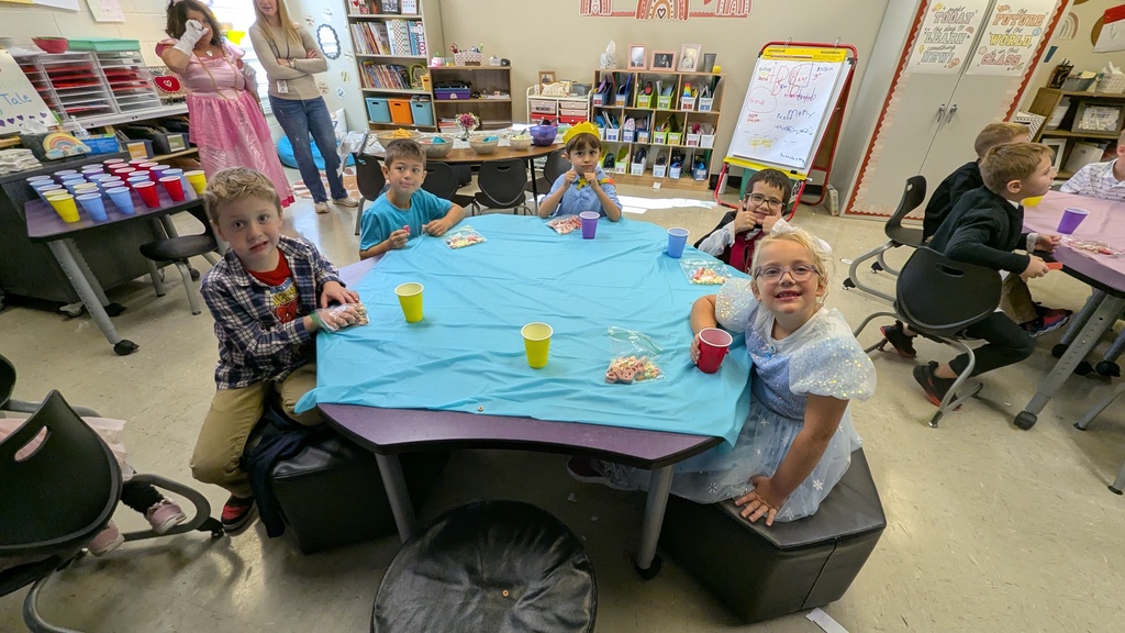 First graders enjoying royal refreshments at their Royal Ball