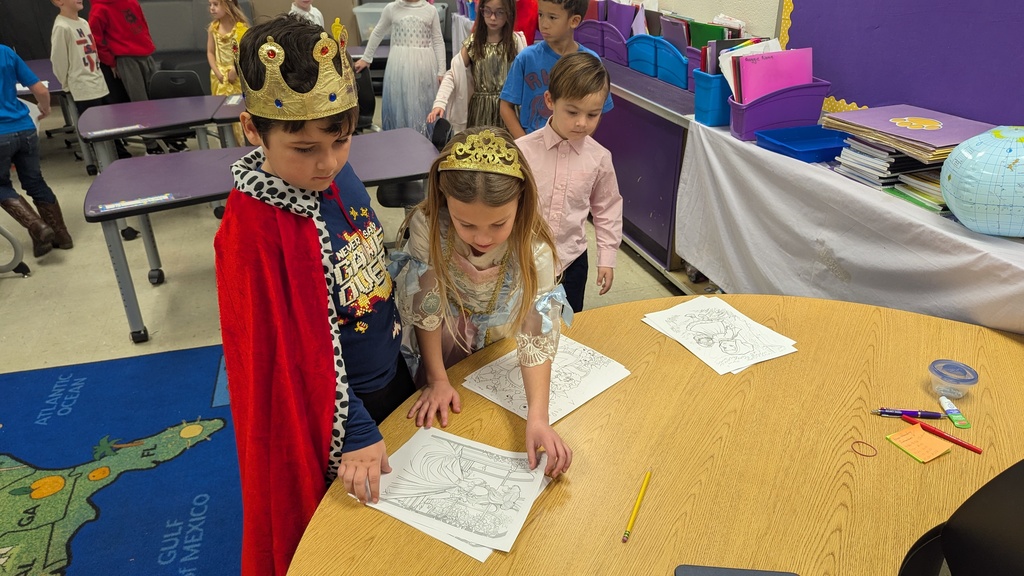 First graders picking out a picture to color
