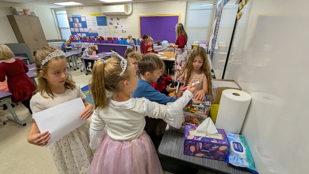 First graders picking out different color markers