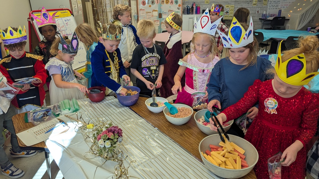 First graders enjoying royal refreshments at their Royal Ball