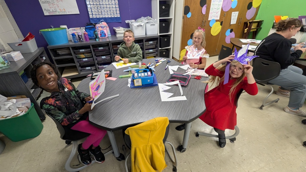 First graders making their own crowns