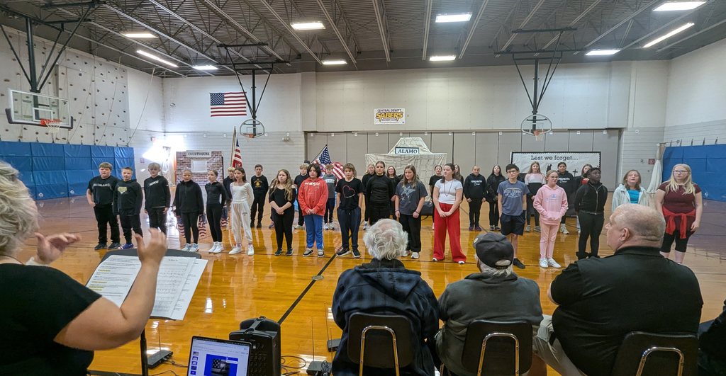 CDIS students performing at Veterans Day assembly