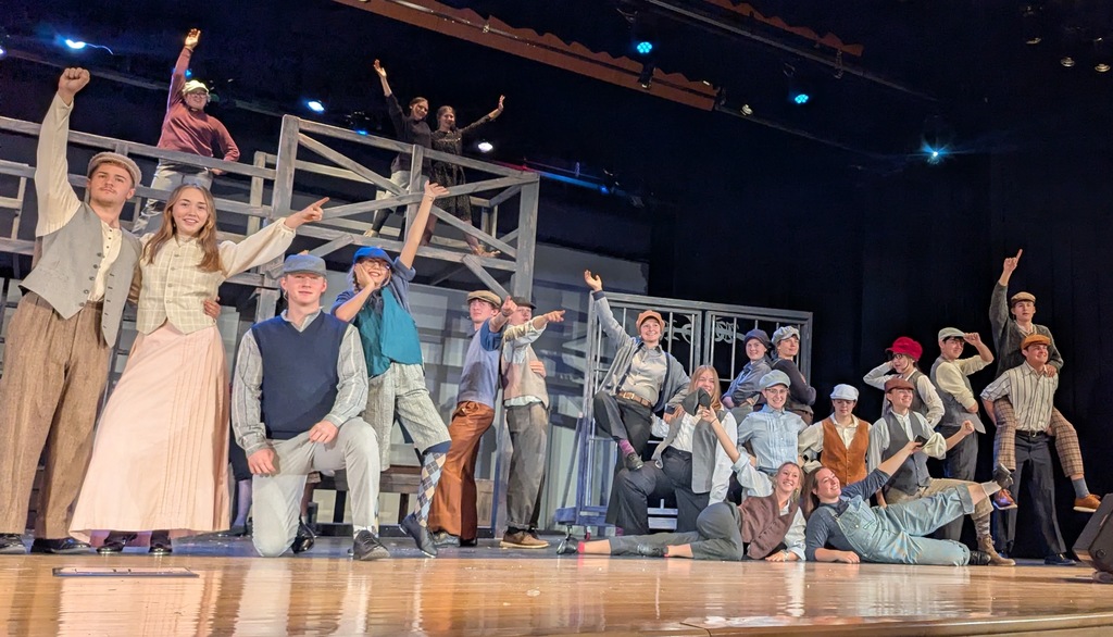 Cast performing in CDHS musical "Newsies"