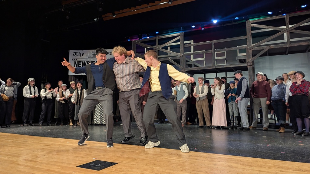 Cast performing in CDHS musical "Newsies"
