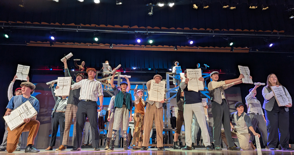 Cast performing in CDHS musical "Newsies"