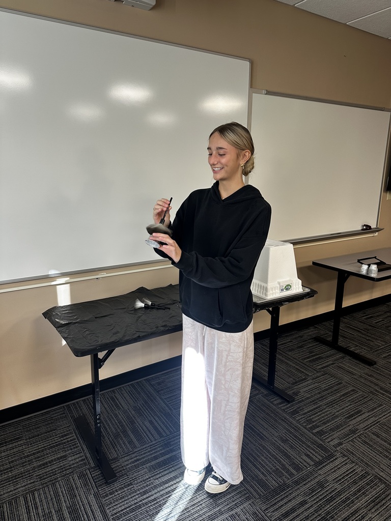 Students learning about Criminal Justice Academy and how to fingerprint people at Clinton Academy Preview Day