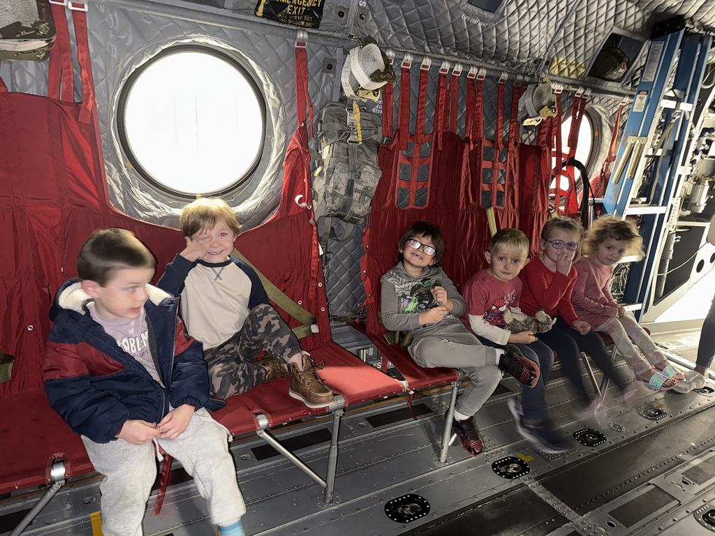 Preschoolers learning about Chinooks at Mt. Joy Aviation Hangar
