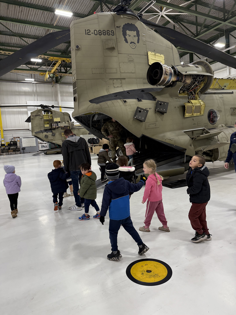 Preschoolers learning about Chinooks at Mt. Joy Aviation Hangar