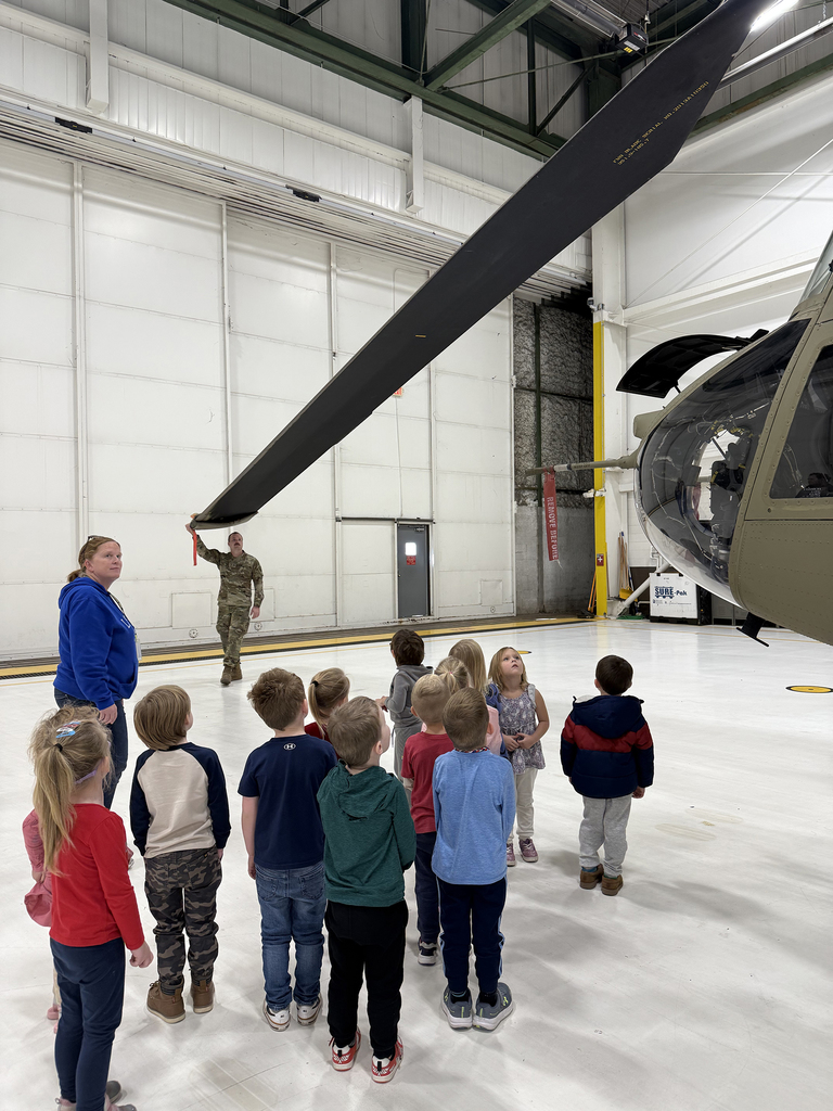 Preschoolers learning about Chinooks at Mt. Joy Aviation Hangar