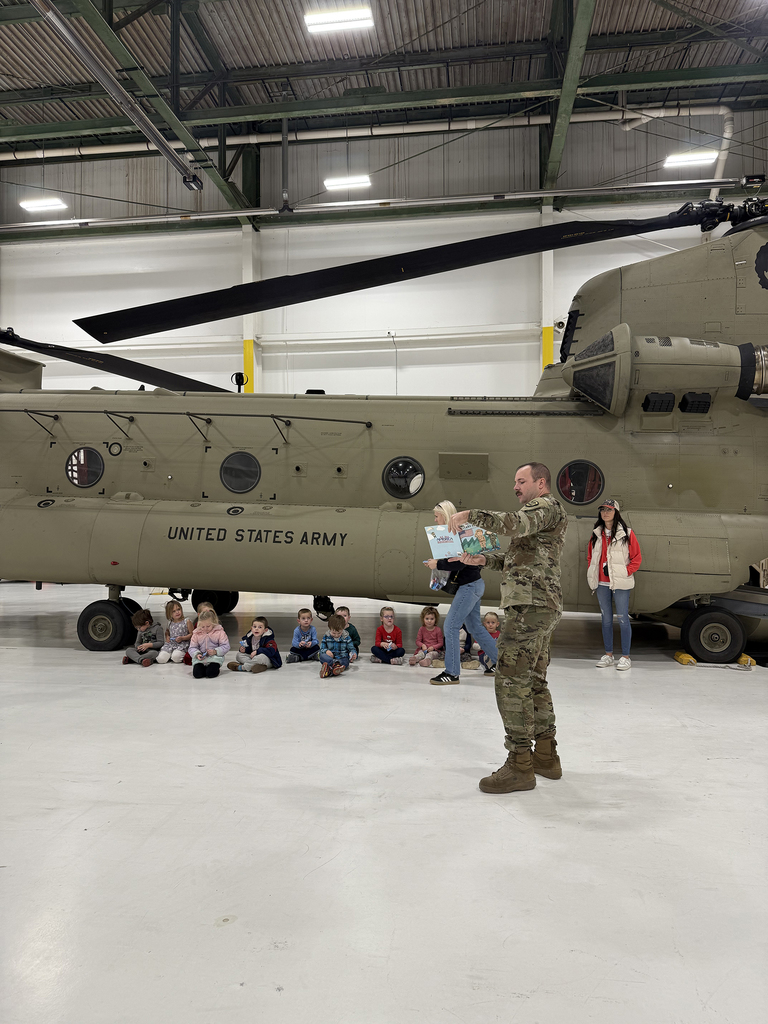Preschoolers learning about Chinooks at Mt. Joy Aviation Hangar