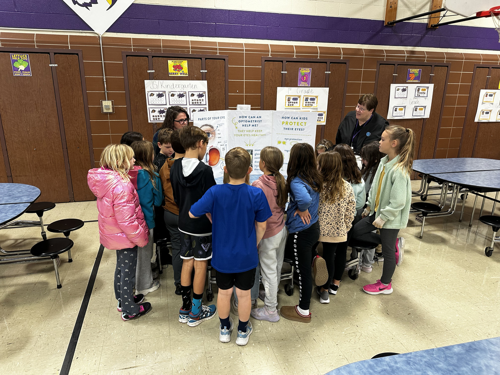 Students learning about our eyes from Dr. Hayward's staff