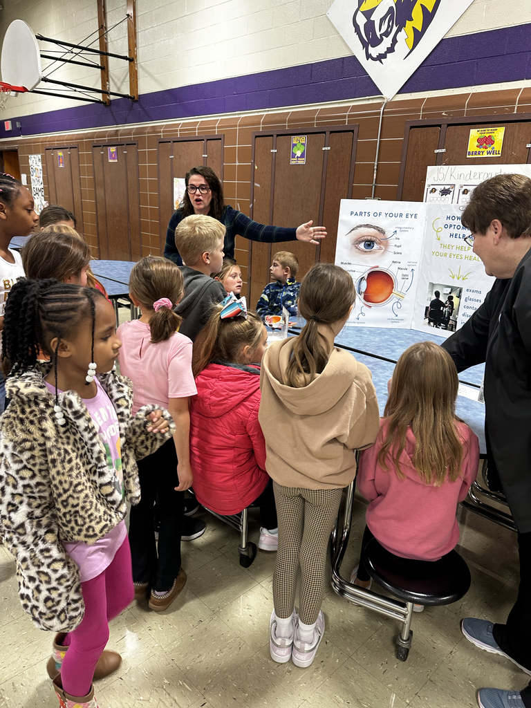Students learning about our eyes from Dr. Hayward's staff