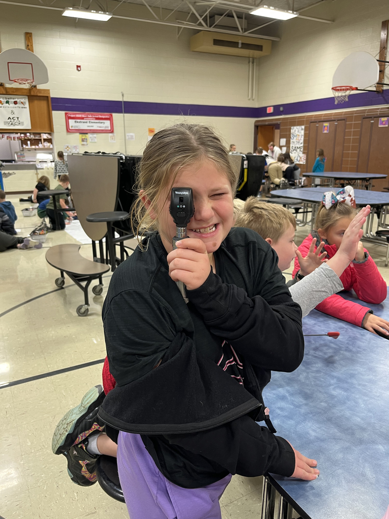 Student using a retinoscope