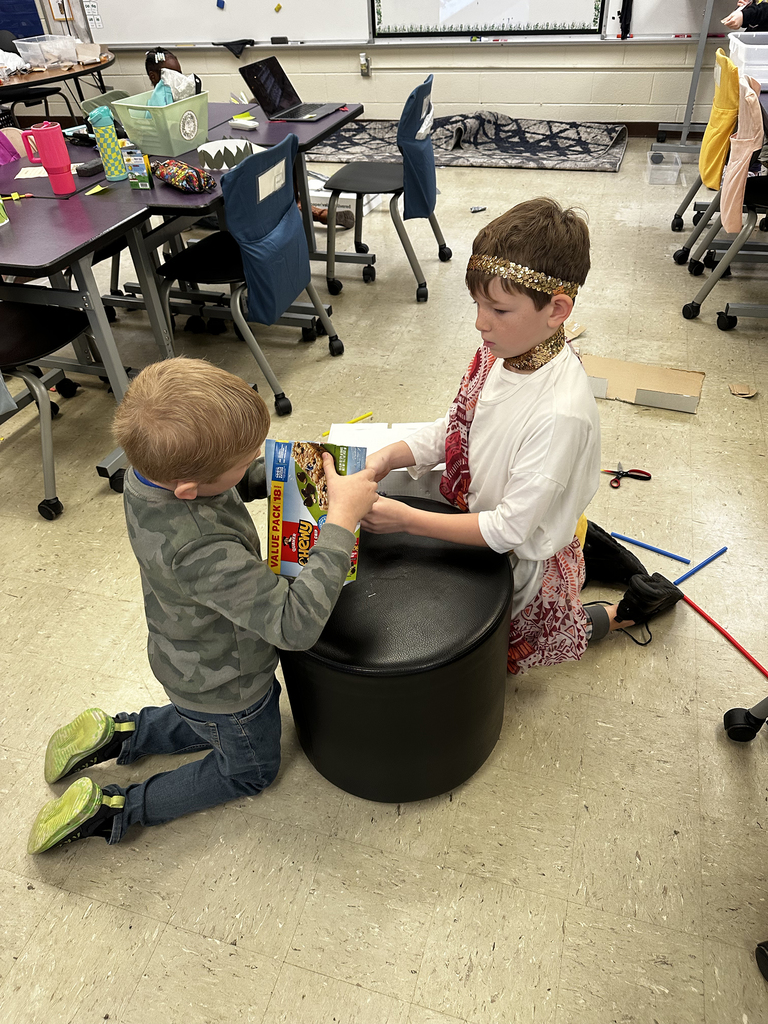 Third graders building and testing aquaducts