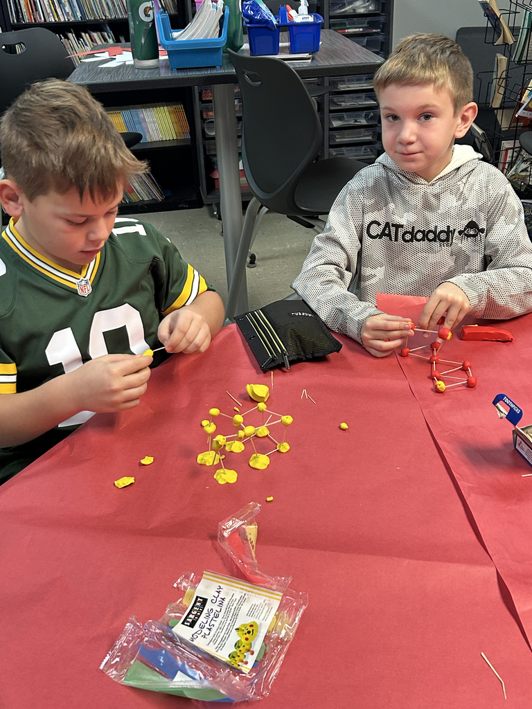 Third graders building Roman structures