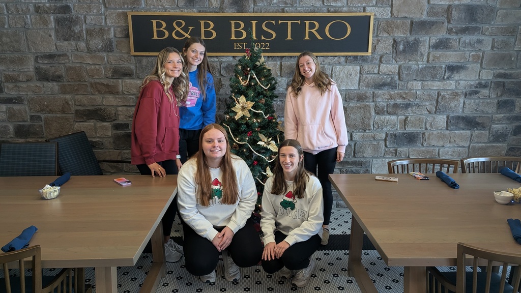 FFA and NHS students decorating Christmas trees at Fieldstone Senior Living