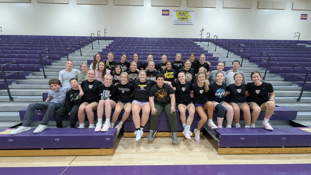 Saber girls basketball team and Unified Special Olympic athletes and partners