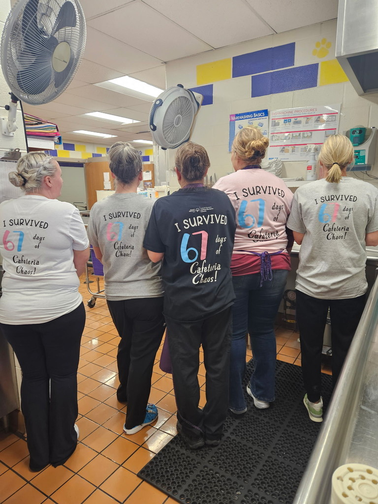 CDIS Nutrition Services staff having fun surprising students with 6-7 celebration