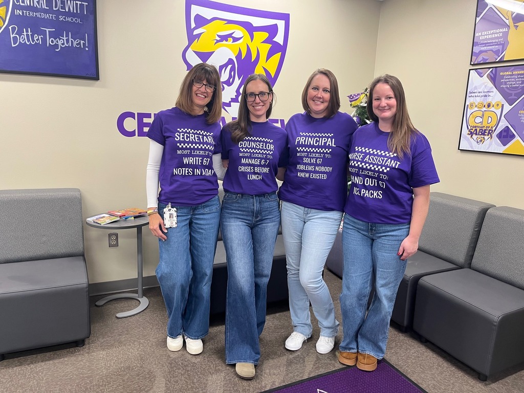 CDIS secretary, counselor, principal and nursing assistant showing off their 6-7 gear
