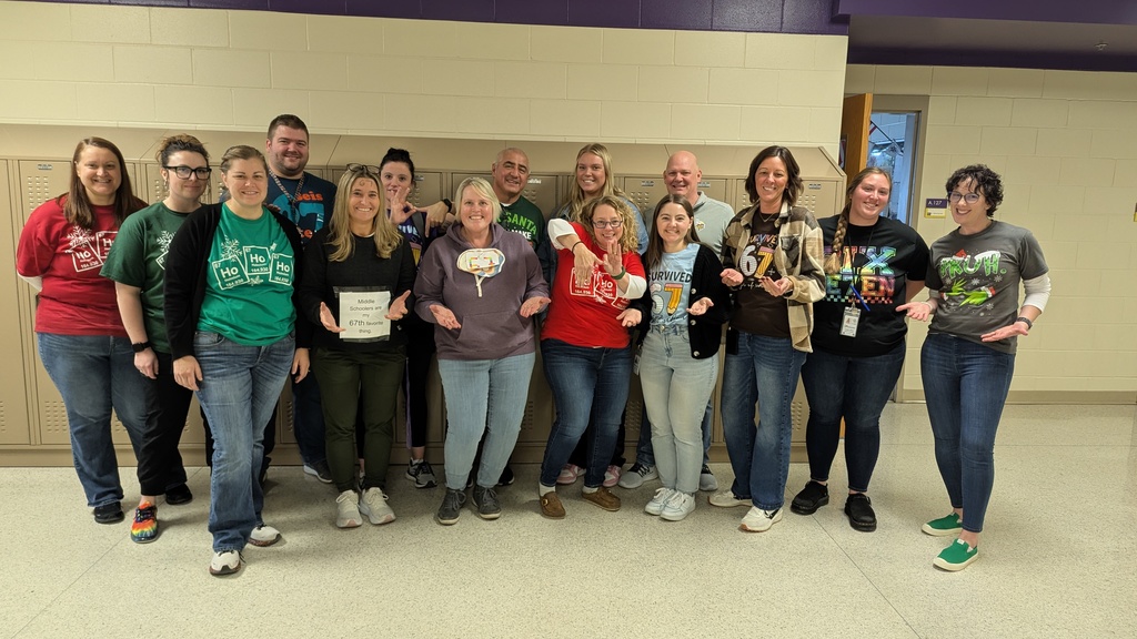 CDMS staff having fun surprising students with 6-7 celebration