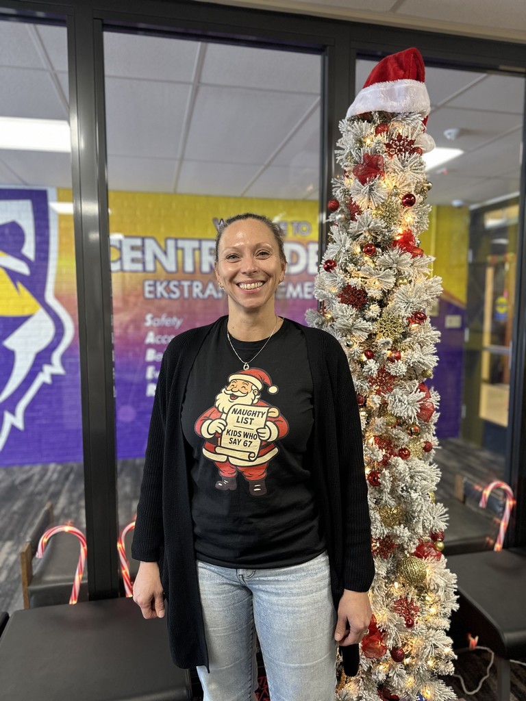 Mrs. Slaymaker showing off her 6-7 sweathshirt